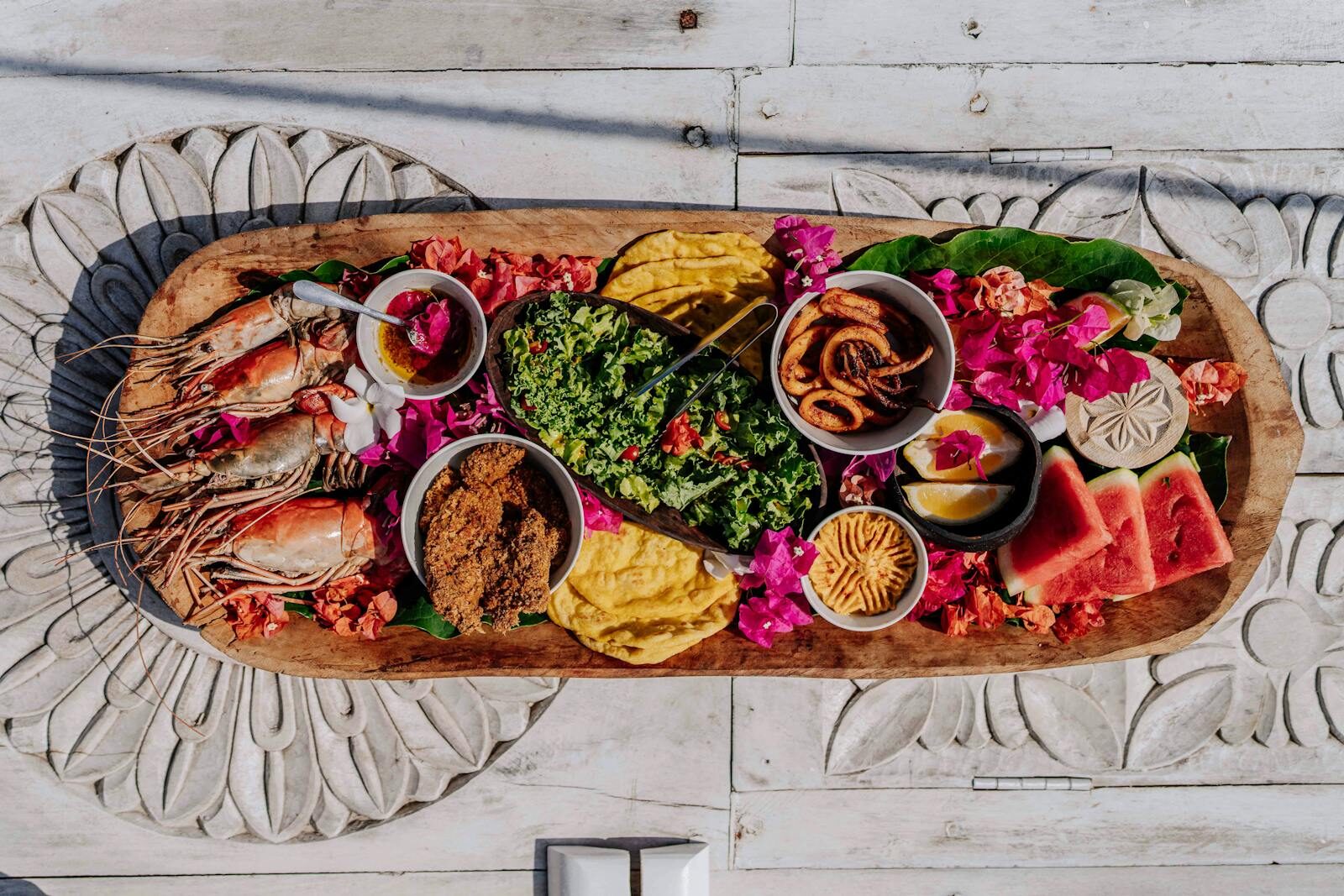 Authentic Zanzibar seafood platter with fresh tropical fruits and local delicacies.