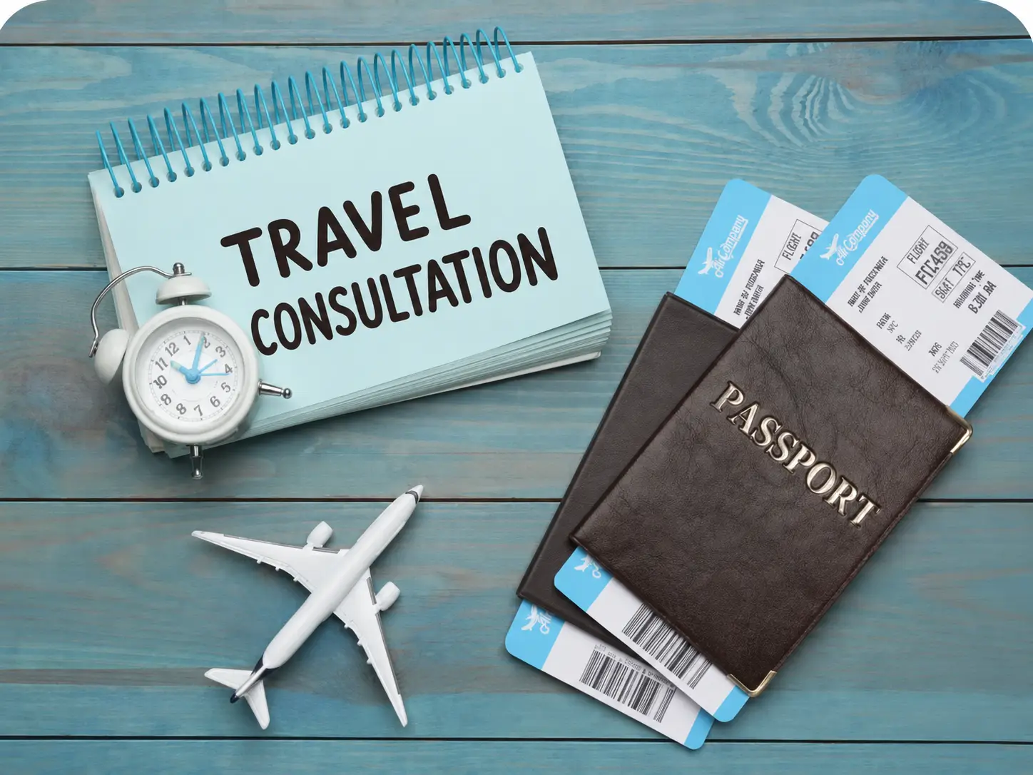 Travel Consultation services by McXotic Tours featuring a travel notebook, passport, airline tickets, alarm clock, and airplane on a blue wooden background.